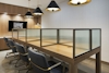 a desk with a chair in a room
