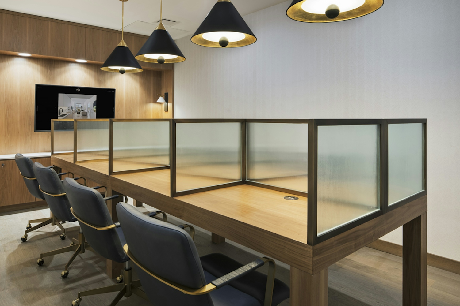 a desk with a chair in a room