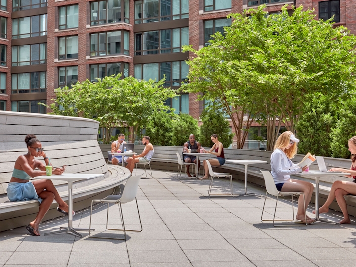 a group of people sitting on a bench