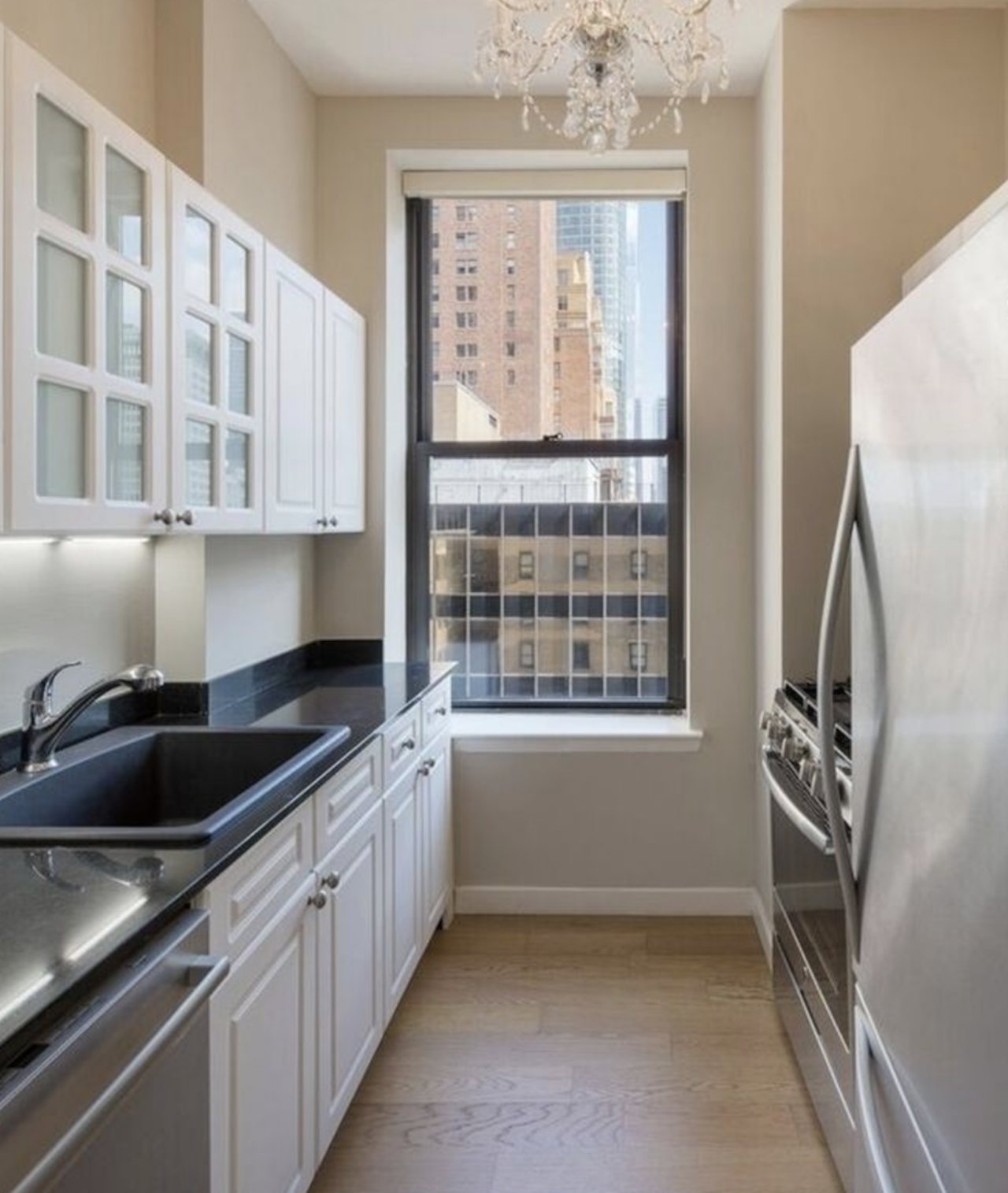 a kitchen with a sink and a window