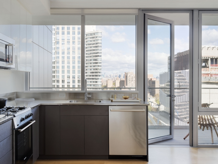 a kitchen with a large window