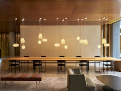 Thumbnail of Gotham West: 233 a room filled with furniture and a table in a restaurant