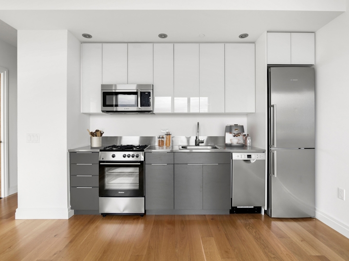 a kitchen with a wood floor