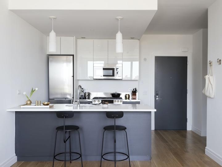a kitchen with a wood floor