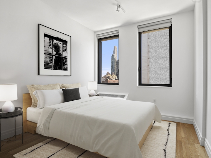 a bedroom with a bed in a hotel room
