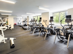 Thumbnail of Atlas New York: 22D a room filled with furniture and a table