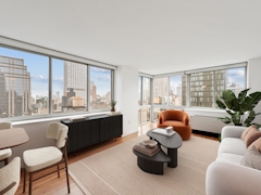 Thumbnail of Atlas New York: 33F a living room filled with furniture and a large window