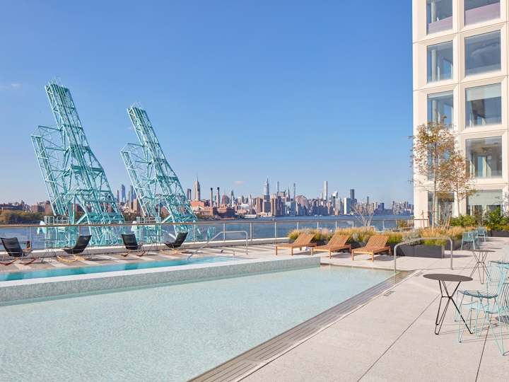 a beach with a city in the background