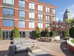 Thumbnail of The Nicole: 4K a large brick building