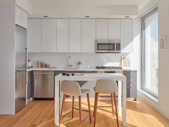 a kitchen with a dining room table