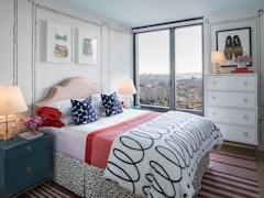 Thumbnail of The Ashland: 24C a bedroom with a bed in a room