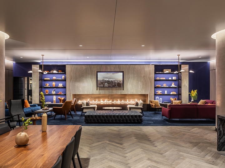 a living room filled with furniture and a fireplace
