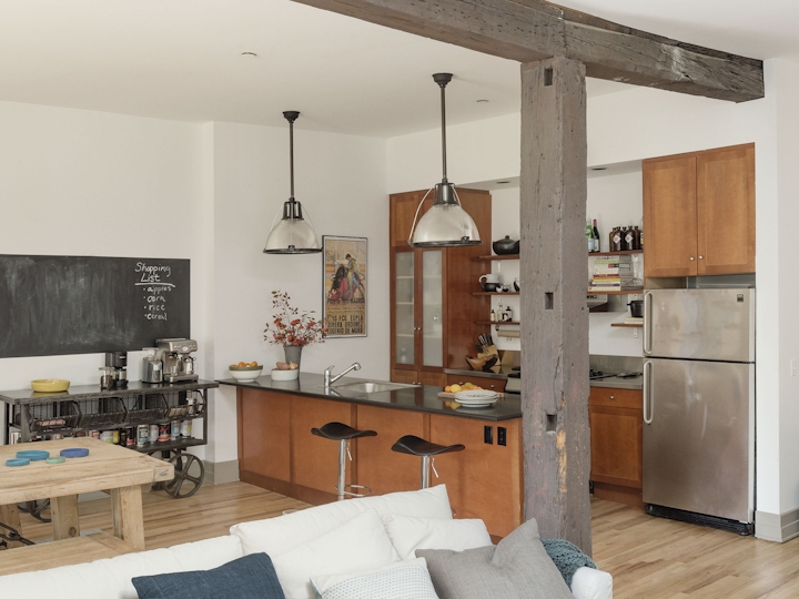 a kitchen with a table in a room