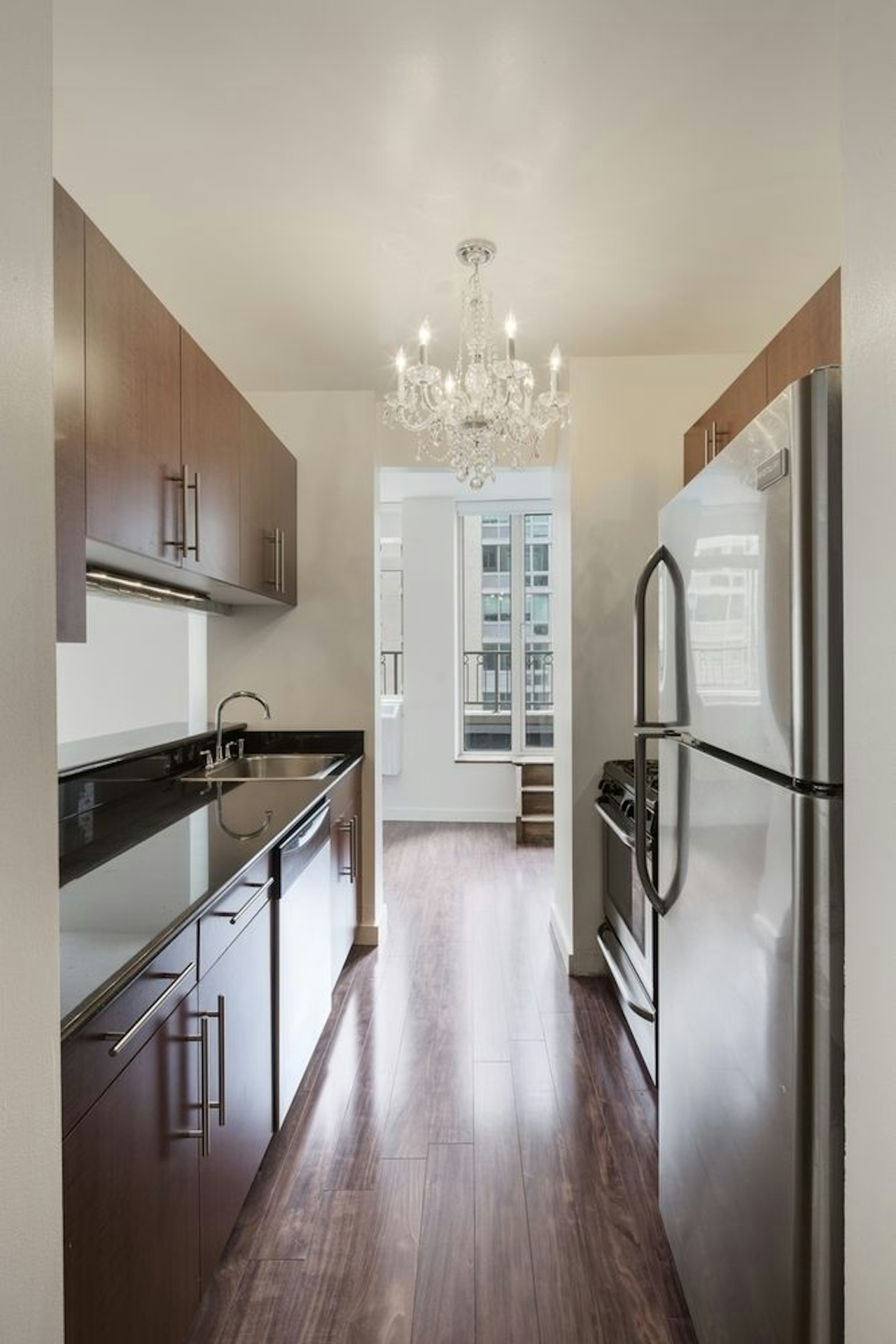 a stainless steel refrigerator in a kitchen