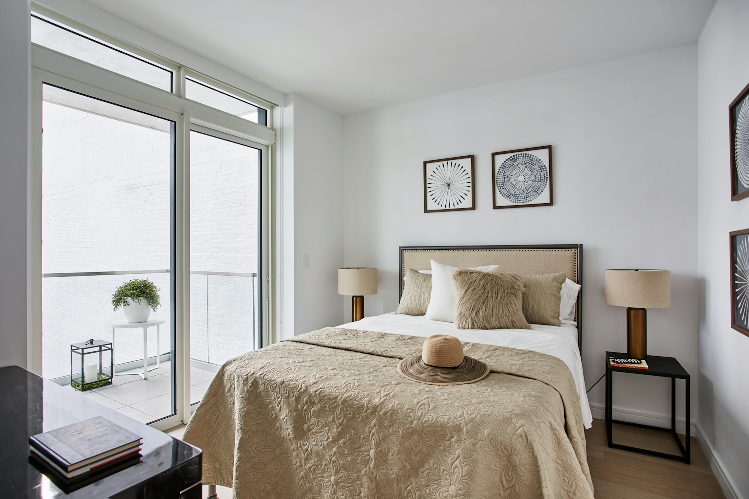 a living room filled with furniture and a large window