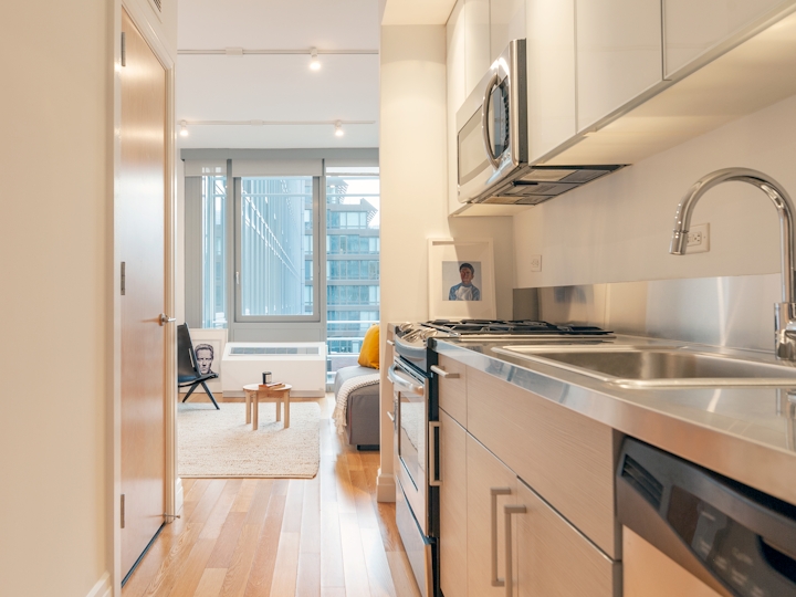 a kitchen with a stove and a sink