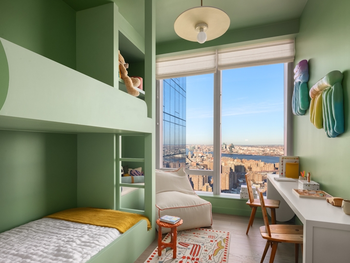 a bedroom with a large window