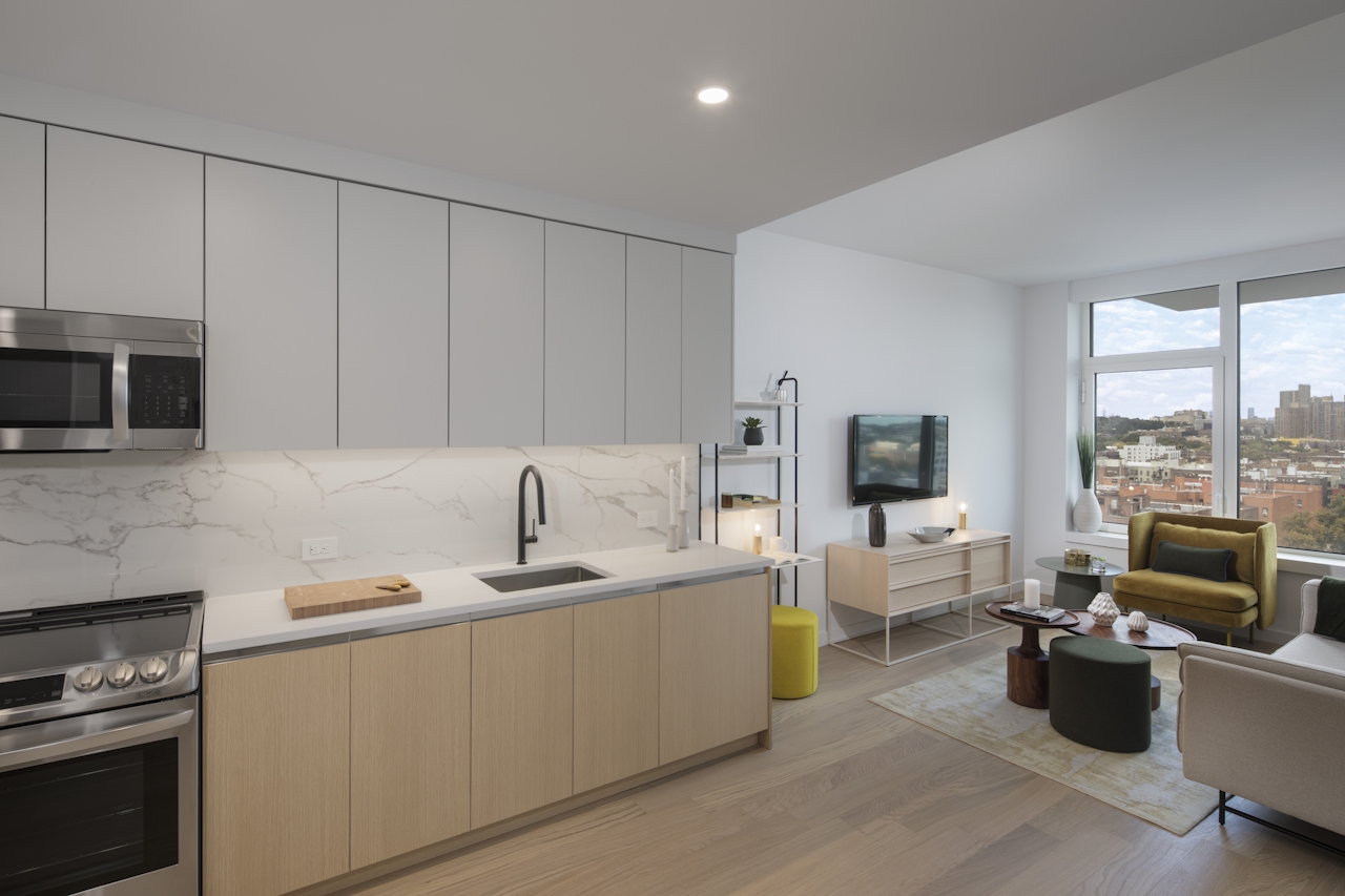 a large kitchen with stainless steel appliances