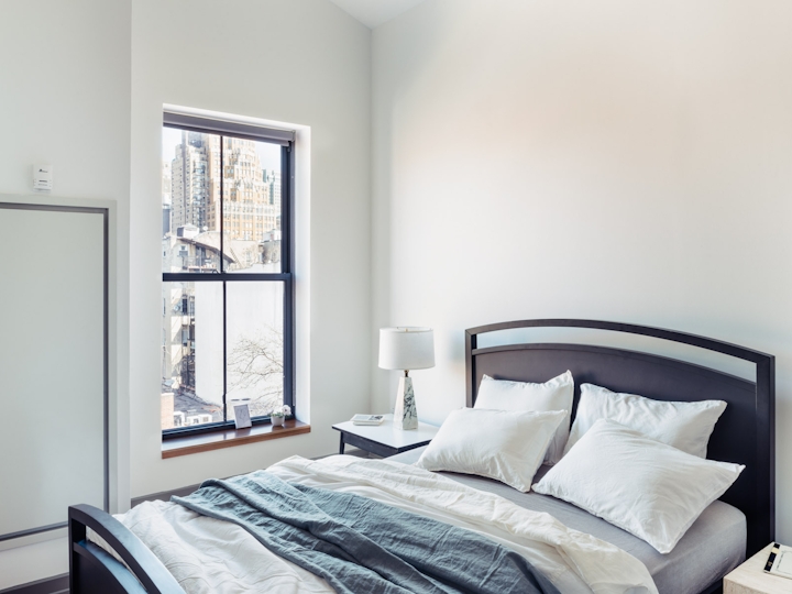 a bedroom with a bed in a hotel room