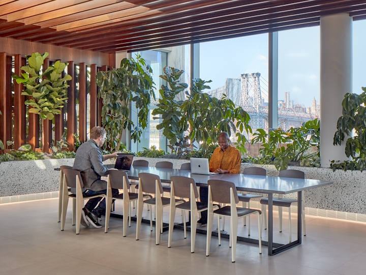 a dining room table in front of a building