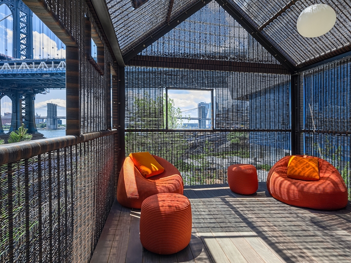 a chair sitting in front of a building