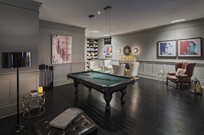 a living room filled with furniture and a tv