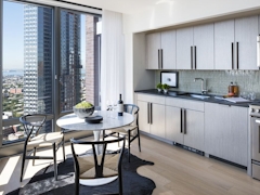 Thumbnail of The Ashland: 39J a kitchen with an island in the middle of a room