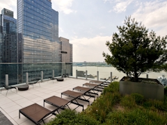 Thumbnail of Gotham West: 2717 a tall building in a city park