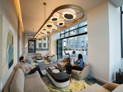 Thumbnail of The Ashland: 38G a group of people in a room