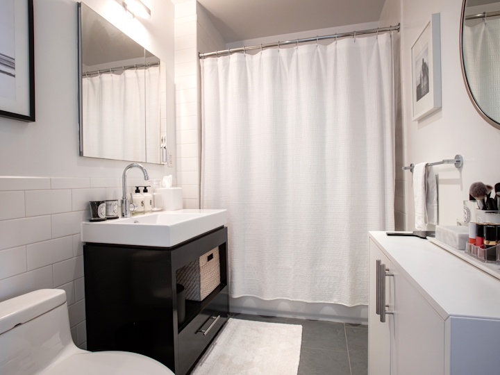 a kitchen with a sink and a shower