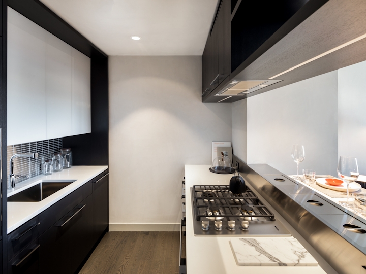 a modern kitchen with stainless steel appliances