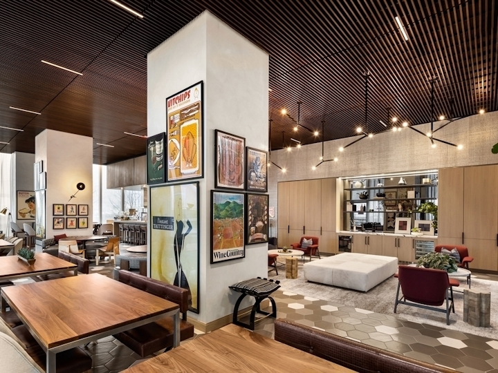 a room filled with furniture and a large window