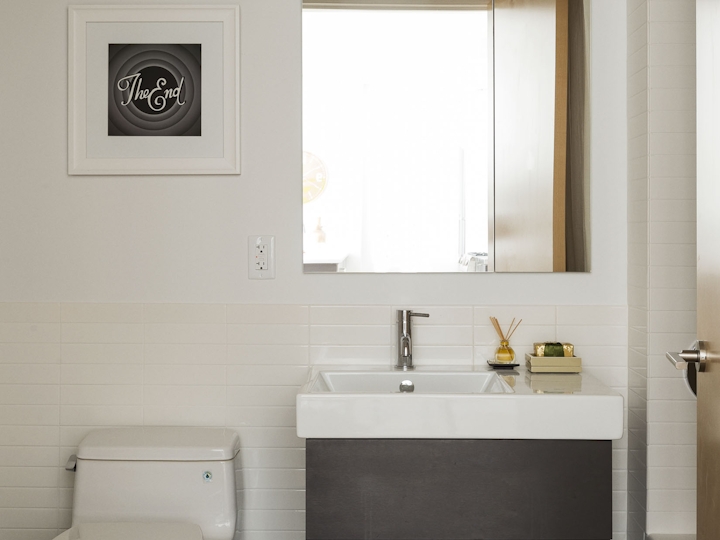 a restroom with a sink and a mirror
