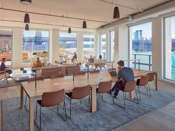 a room filled with furniture and a large window