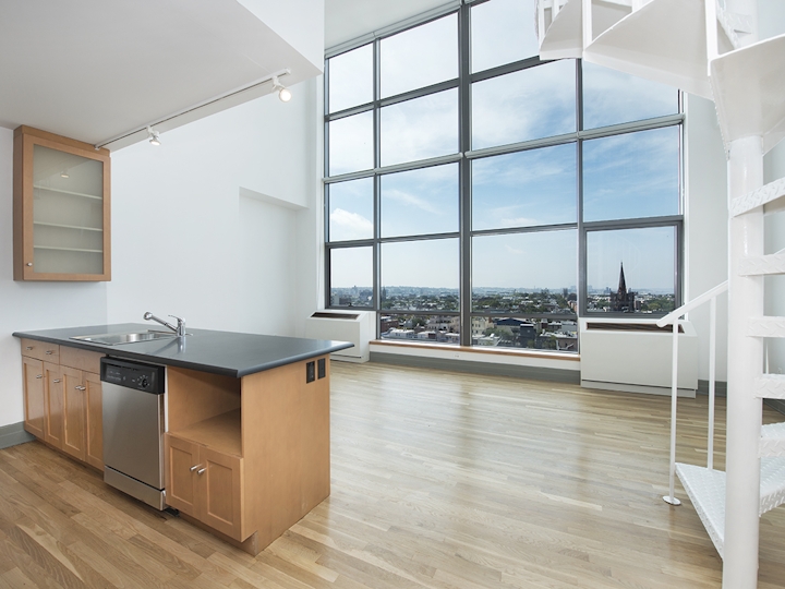 a kitchen with a wood floor