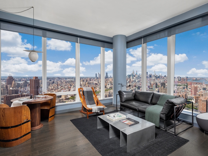 a room filled with furniture and a large window