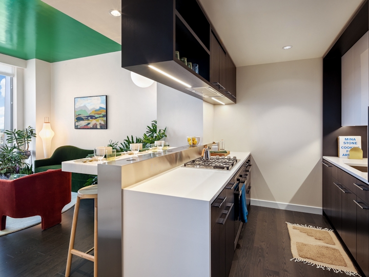 a modern kitchen with an island in the middle of a room