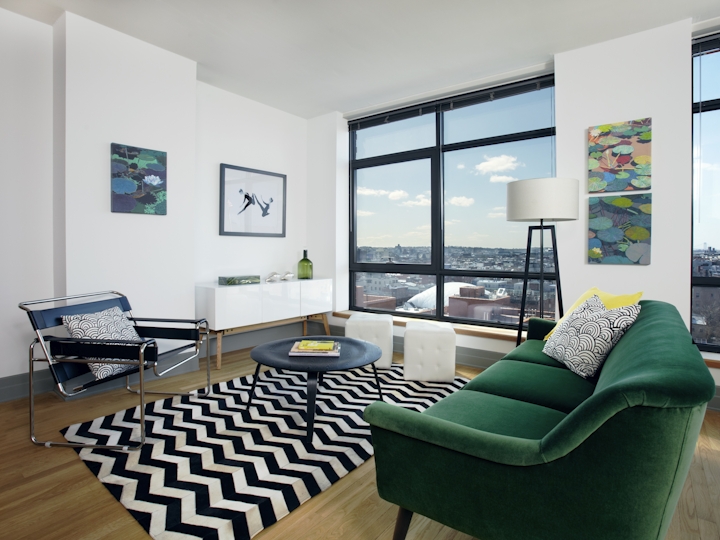 a living room with a leather chair