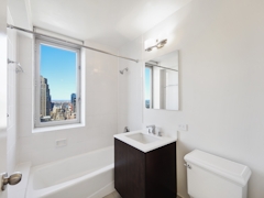 Thumbnail of Atlas New York: 44C a room with a sink and a mirror