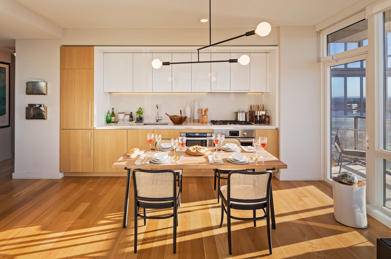 a kitchen with a dining room table