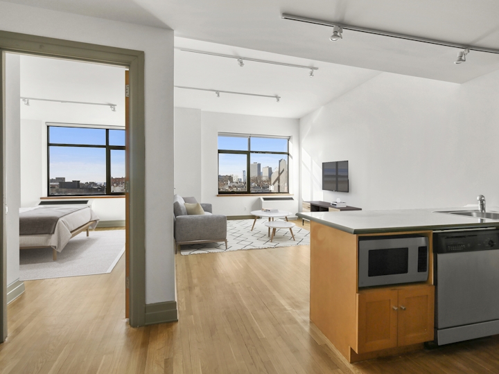 a kitchen with a wood floor