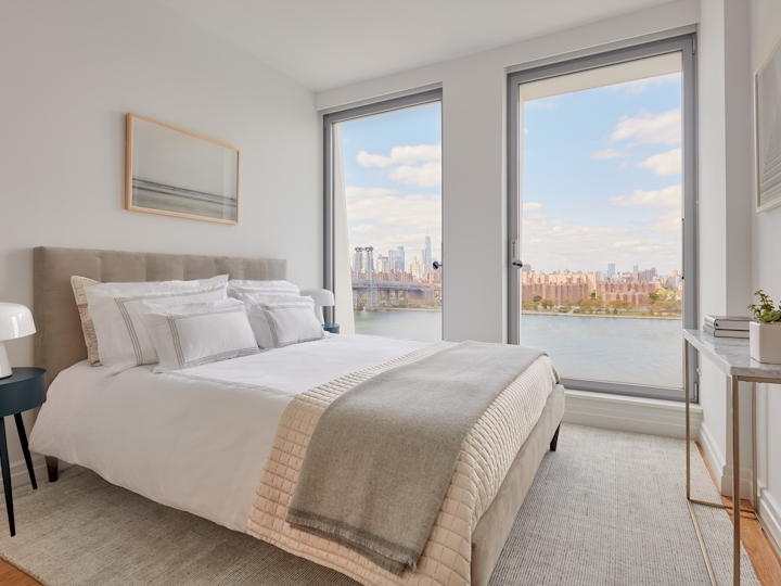 a bedroom with a large bed in a hotel room
