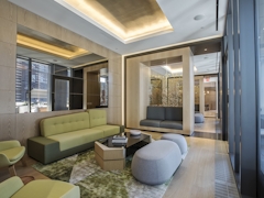 Thumbnail of The Ashland: PH2A a living room filled with furniture and a large window