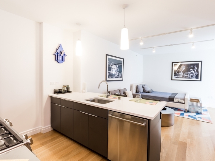 a kitchen with a wood floor