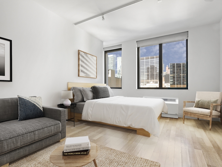 a living room filled with furniture and a flat screen tv