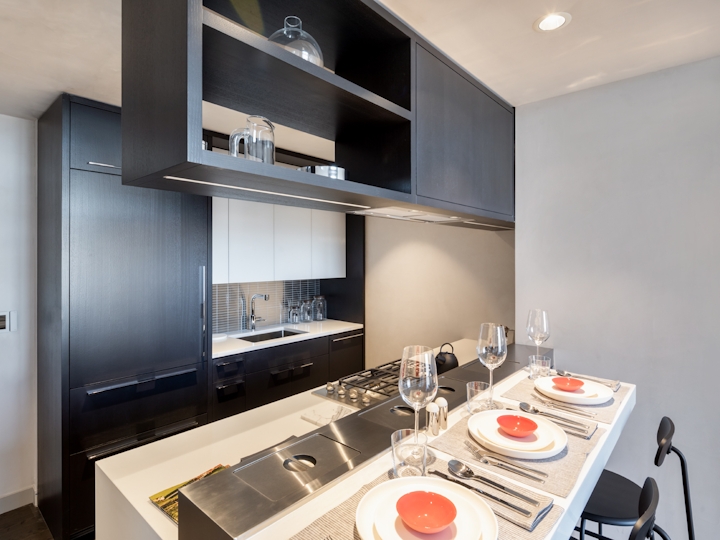 a kitchen with a sink and a microwave