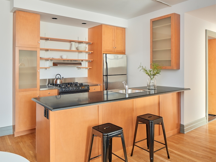 a kitchen with a table in a room