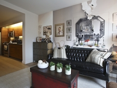 Thumbnail of Gotham West: 531 a living room filled with furniture and a fire place