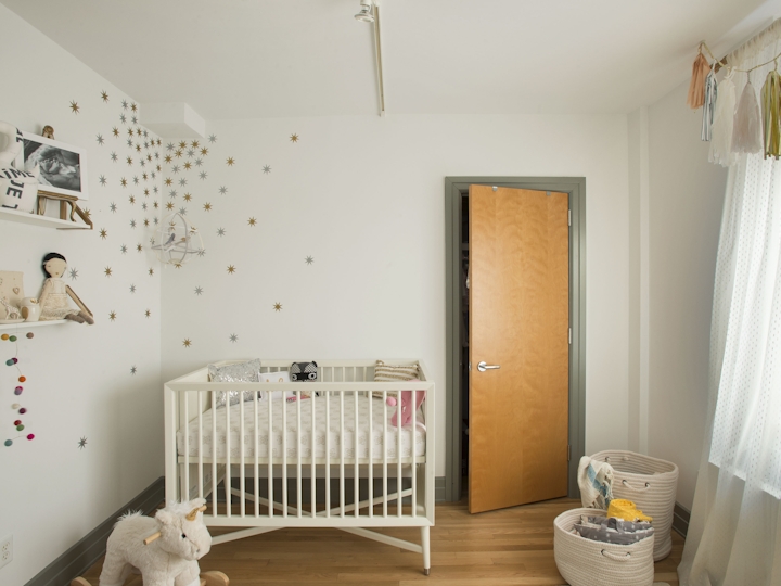 a bedroom with a bed and a mirror