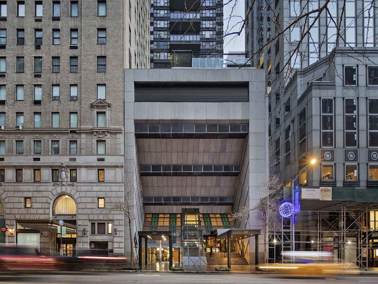 a city street in front of a building